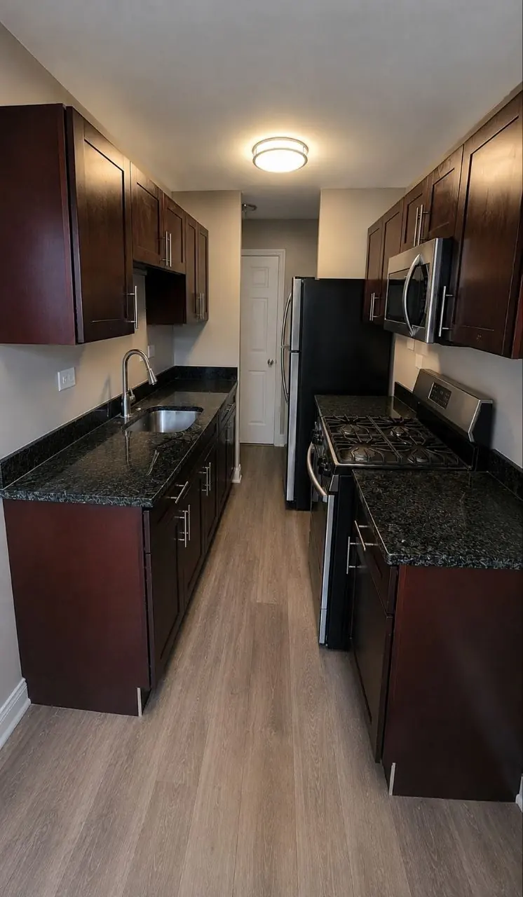 After: galley kitchen during a move-out cleaning